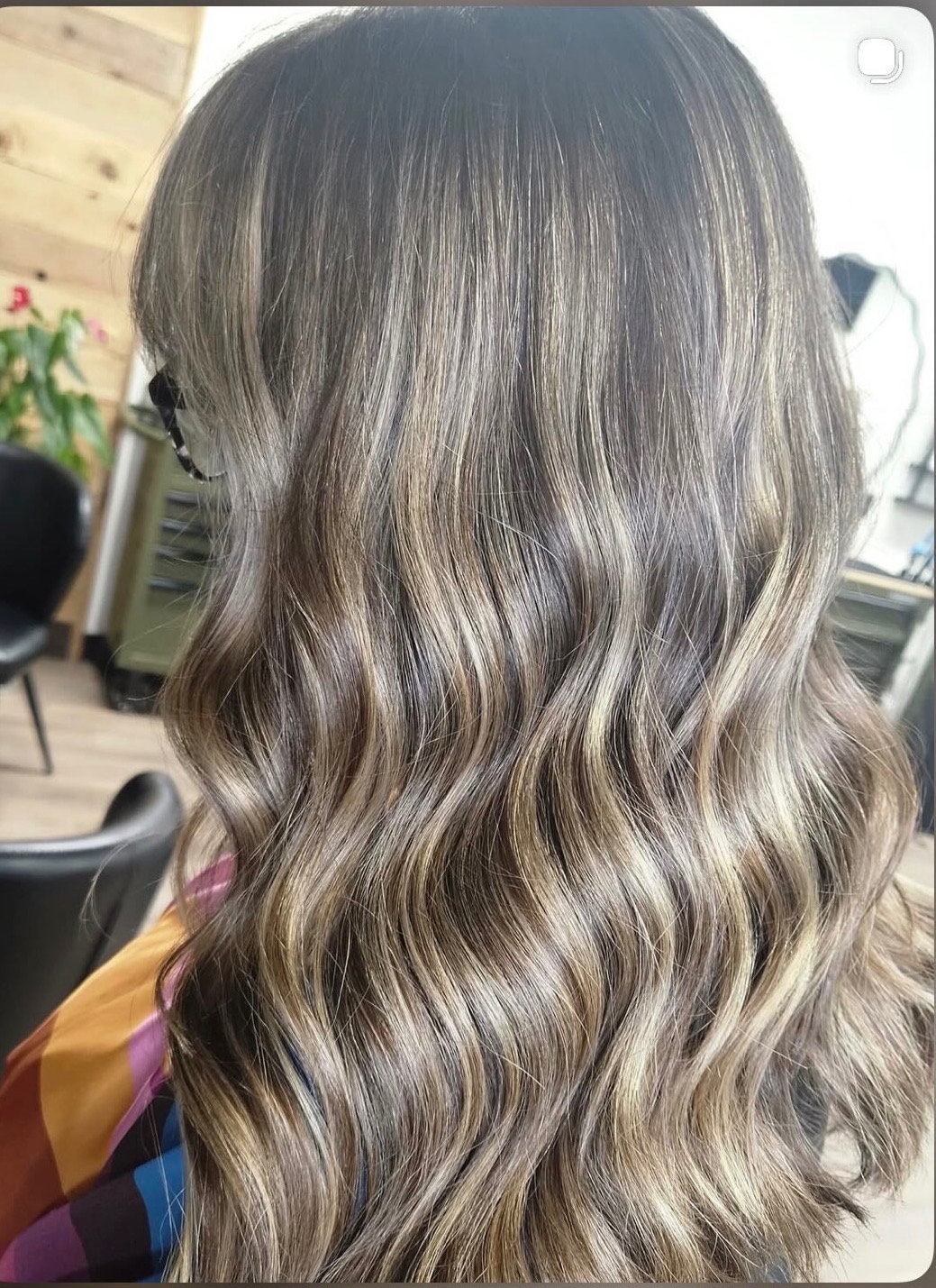 Bronde balayage with dimensional highlights styled in waves by The Hair Collective Oklahoma City