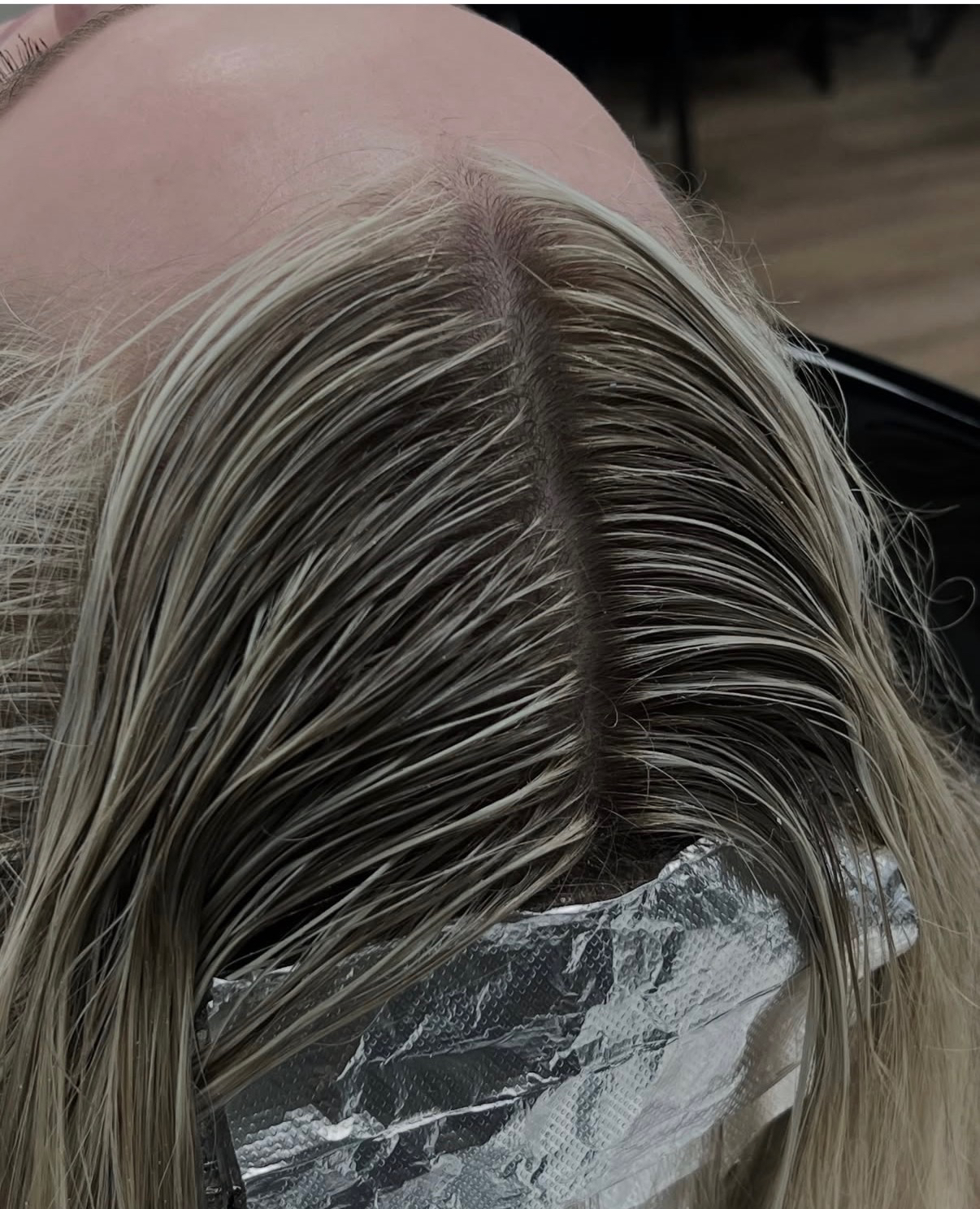 Blonde foil highlights and root work in progress at Oklahoma City hair salon The Hair Collective